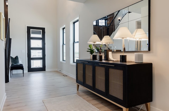 foyer entrance featuring light hardwood / wood-style flooring