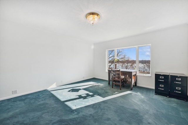 unfurnished office with dark colored carpet