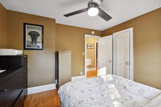 bedroom featuring ceiling fan and light hardwood / wood-style flooring