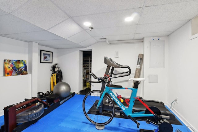 workout room with a drop ceiling