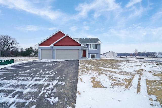 view of front of home with a garage