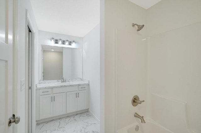 bathroom featuring bathtub / shower combination and vanity