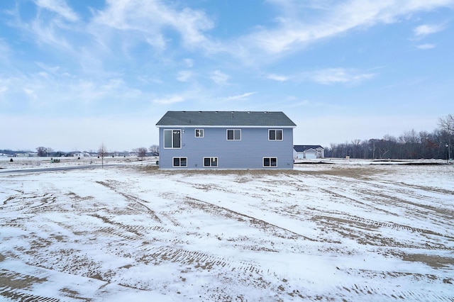 view of snow covered property