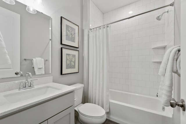 full bathroom featuring vanity, toilet, and shower / tub combo with curtain