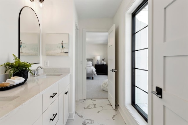 bathroom with vanity and plenty of natural light