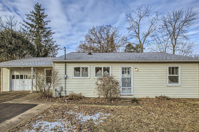 view of front of property with a garage