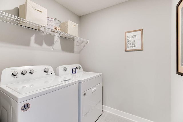 laundry room with washer and dryer