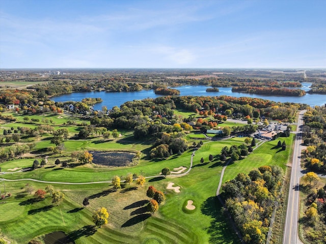 drone / aerial view with a water view