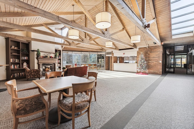 dining area with wood ceiling, beam ceiling, carpet floors, and high vaulted ceiling