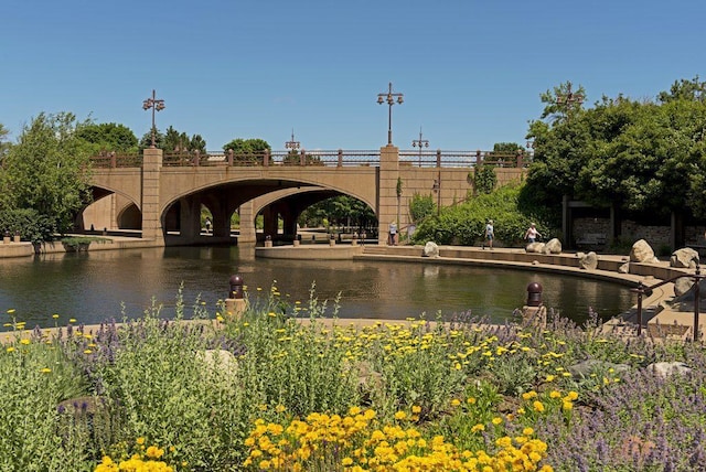 surrounding community with a water view