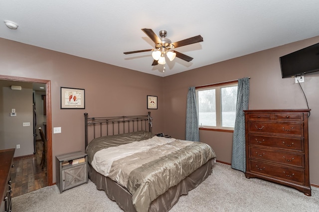 2155 Maple Leaf Ln NE, Owatonna, MN 55060 - bedroom featuring light colored carpet and ceiling fan