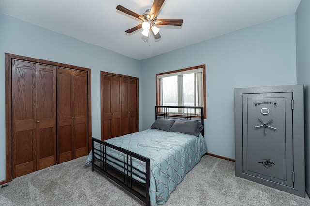 2155 Maple Leaf Ln NE, Owatonna, MN 55060 - carpeted bedroom with two closets and ceiling fan