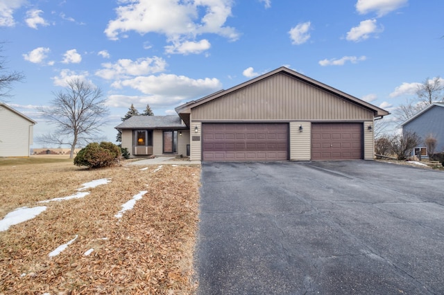 single story home featuring a garage