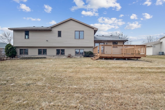 back of property featuring central AC unit, a yard, and a wooden deck