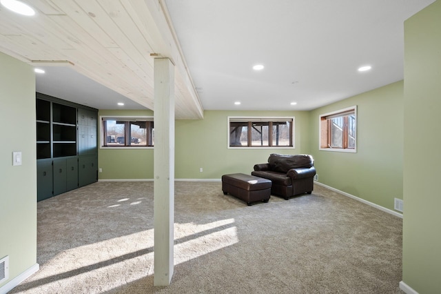 unfurnished living room with light carpet