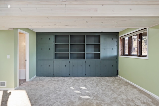 interior space featuring light colored carpet