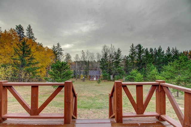 deck featuring a lawn