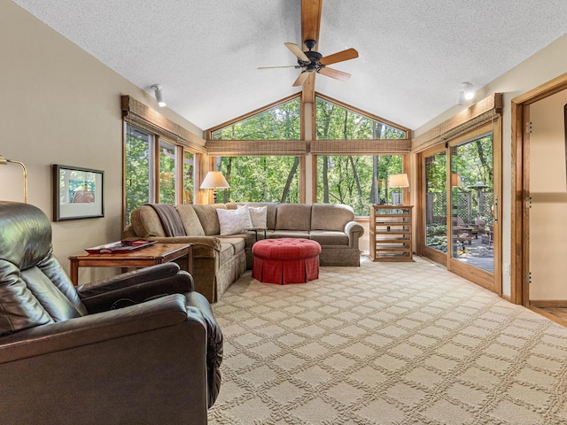 6678 Hemlock Ln N, Maple Grove, MN 55369 - carpeted living room with ceiling fan, a textured ceiling, and vaulted ceiling