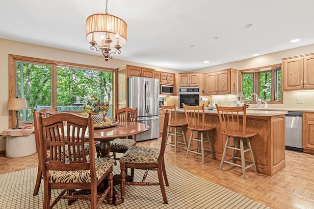 6678 Hemlock Ln N, Maple Grove, MN 55369 - dining space with a chandelier and recessed lighting