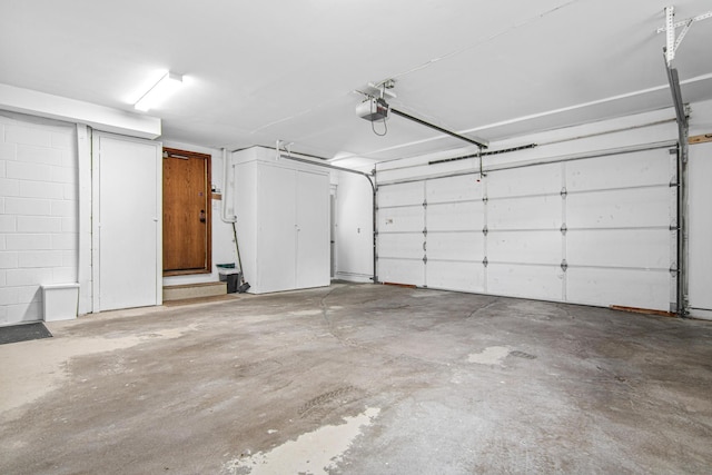 6678 Hemlock Ln N, Maple Grove, MN 55369 - garage featuring a garage door opener