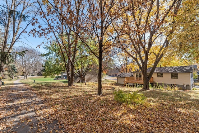 view of yard with a deck