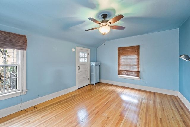 interior space featuring ceiling fan and light hardwood / wood-style flooring