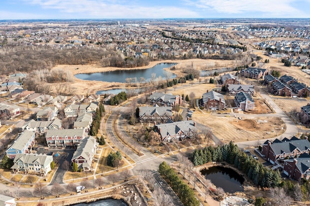 aerial view featuring a water view and a residential view
