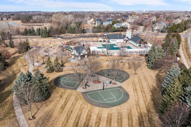 birds eye view of property with a residential view