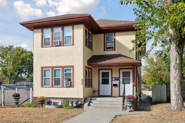 3532 Longfellow Ave, Minneapolis, MN 55407 - view of property featuring stucco siding, a gate, fence, and a shingled roof