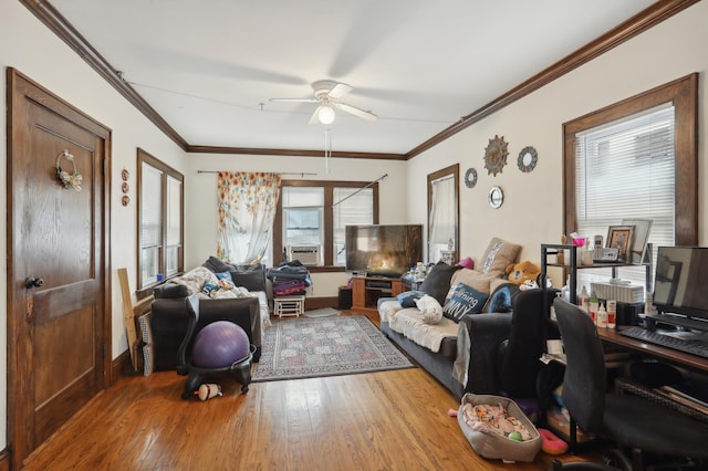 3532 Longfellow Ave, Minneapolis, MN 55407 - living room with wood finished floors, a ceiling fan, baseboards, ornamental molding, and a desk