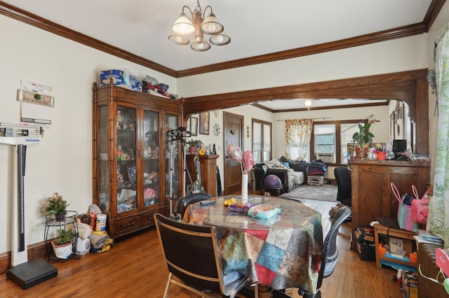 3532 Longfellow Ave, Minneapolis, MN 55407 - dining space featuring a chandelier, ornamental molding, and wood finished floors