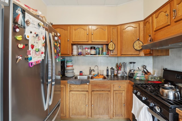 3532 Longfellow Ave, Minneapolis, MN 55407 - kitchen featuring appliances with stainless steel finishes, a sink, decorative backsplash, brown cabinets, and crown molding
