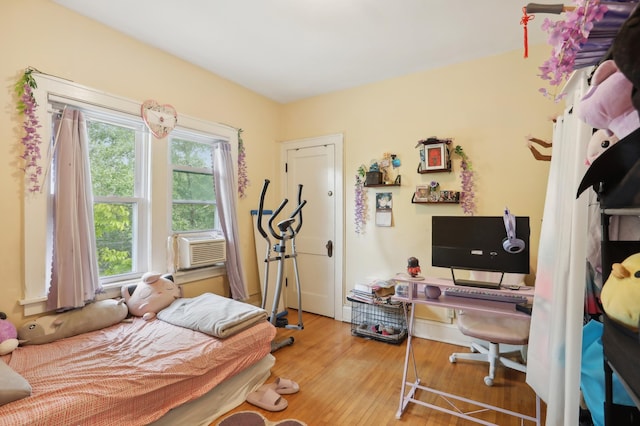 3532 Longfellow Ave, Minneapolis, MN 55407 - bedroom with wood finished floors and cooling unit
