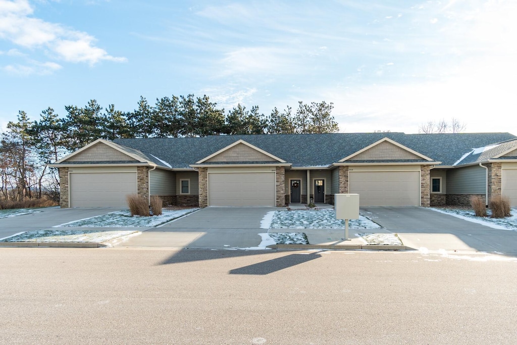 single story home featuring a garage