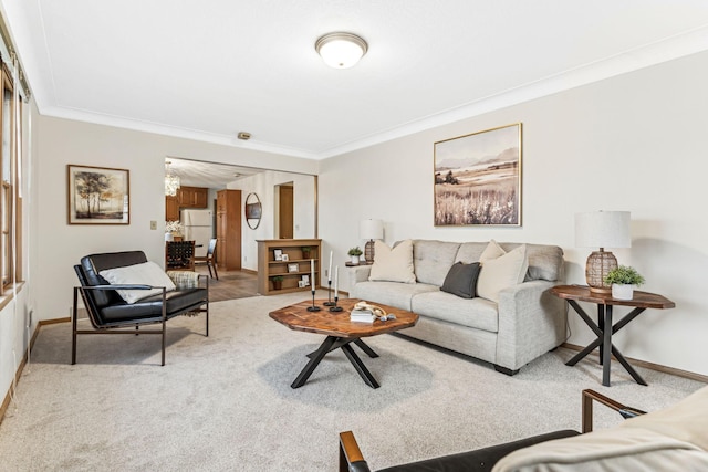 carpeted living room with ornamental molding