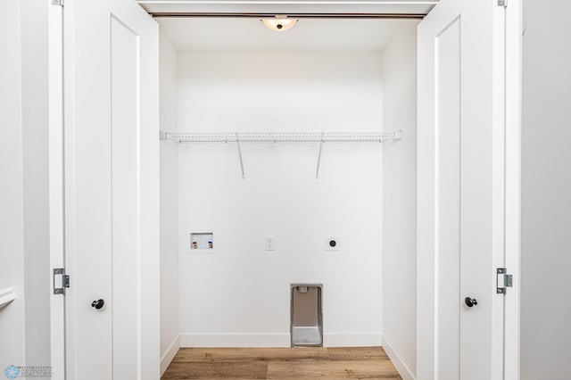 washroom featuring hardwood / wood-style floors, electric dryer hookup, and washer hookup