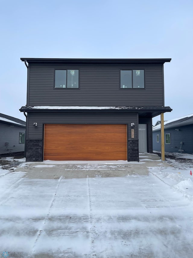 modern home featuring a garage