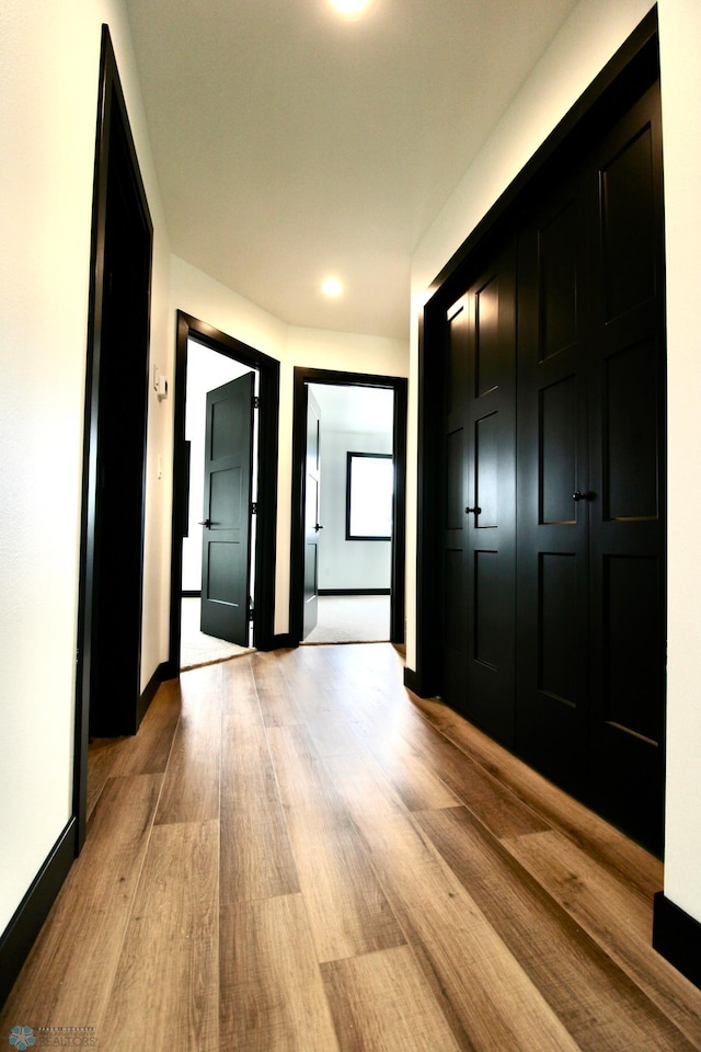 6721 67th Ave S, Horace, ND 58047 - hallway with light wood-style floors and baseboards