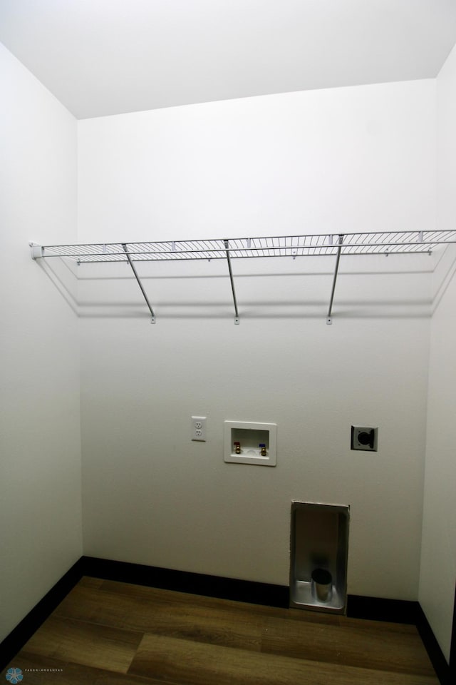 6721 67th Ave S, Horace, ND 58047 - washroom with wood finished floors, electric dryer hookup, washer hookup, and baseboards