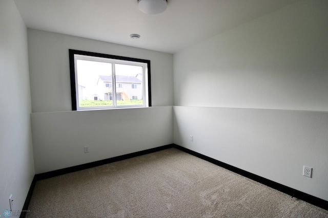 6721 67th Ave S, Horace, ND 58047 - carpeted empty room with a smoke detector and baseboards
