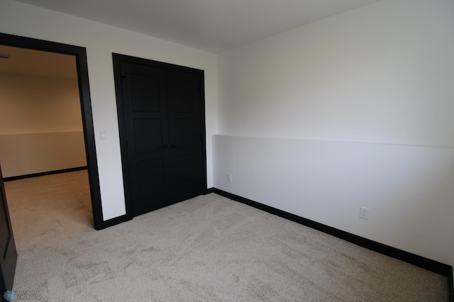 6721 67th Ave S, Horace, ND 58047 - unfurnished bedroom with carpet and baseboards