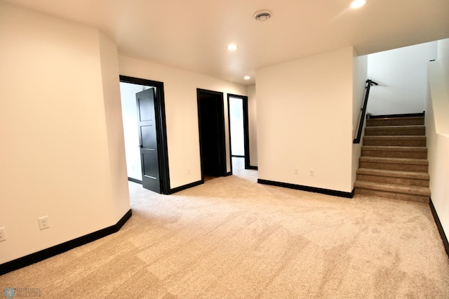 6721 67th Ave S, Horace, ND 58047 - unfurnished room with light carpet, recessed lighting, baseboards, and stairs