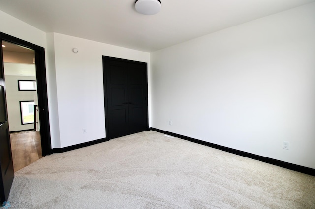 6721 67th Ave S, Horace, ND 58047 - unfurnished bedroom featuring carpet flooring and baseboards