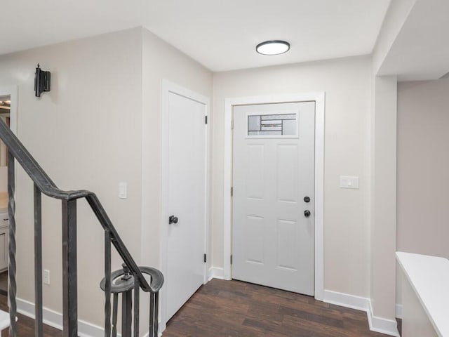 foyer with dark wood-type flooring