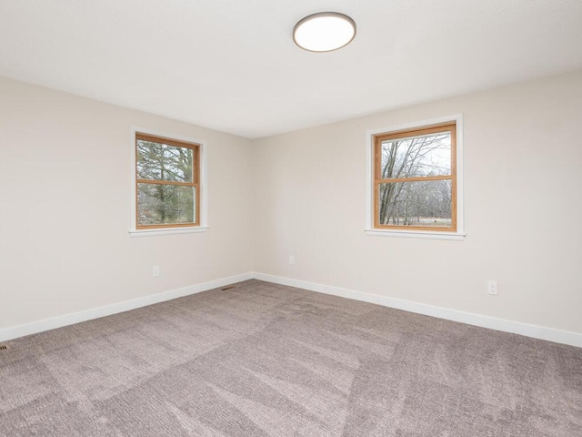 view of carpeted spare room