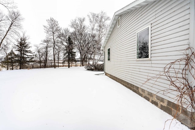 view of snowy yard