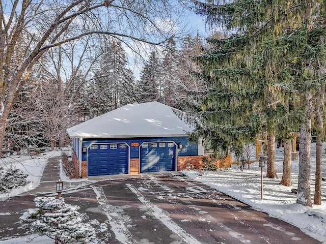 exterior space with a garage