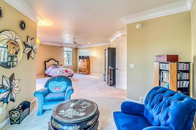 carpeted bedroom with ceiling fan and crown molding