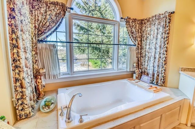 bathroom featuring a bath