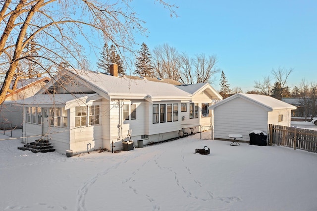 view of snow covered house